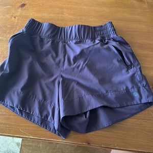 purple running shorts